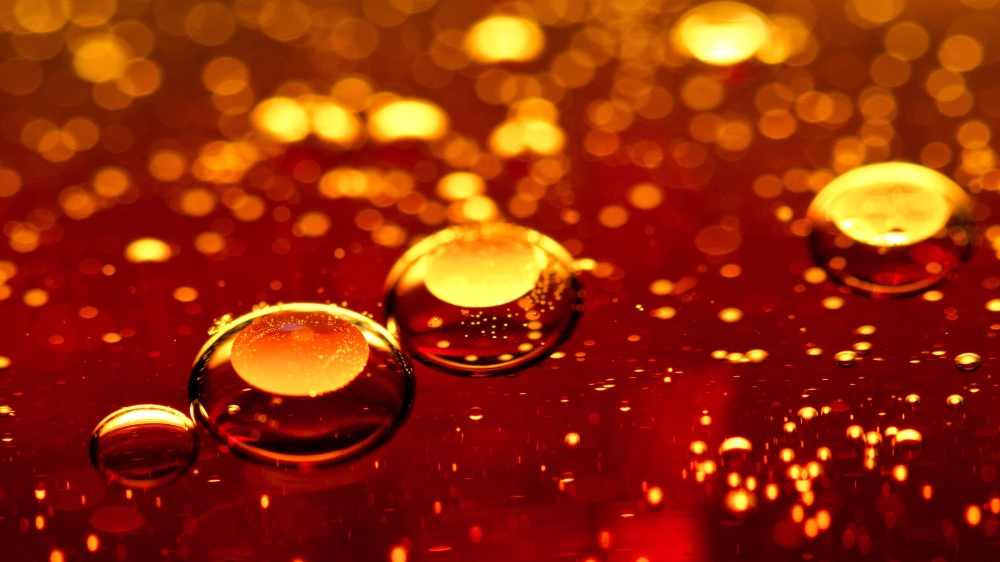 Canva - Oil drops in Coca-Cola.jpg